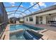 Screened in lanai with pool and hot tub area, as well as access to the house at 17045 Polo Trl, Bradenton, FL 34211
