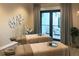 Spa treatment room featuring treatment tables with serene decor, offering a tranquil experience at 17902 Gawthrop Dr # 302, Lakewood Ranch, FL 34211