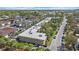 Aerial view of the building with mature landscaping and ample parking for residents and visitors at 2155 Wood St # A20, Sarasota, FL 34237
