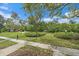 Well-maintained grounds with lush greenery, a gazebo, and inviting walkways at 2155 Wood St # A20, Sarasota, FL 34237