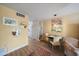 Living and dining area offers natural light, contemporary decor, and a relaxed ambiance at 2155 Wood St # A20, Sarasota, FL 34237
