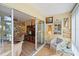 Relaxing sunroom with a seating area and sliding doors to the living room at 2155 Wood St # A20, Sarasota, FL 34237