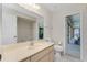 Bathroom with vanity and tiled shower at 25422 Aysen Dr, Punta Gorda, FL 33983