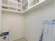 Walk-in closet featuring built-in shelving at 25422 Aysen Dr, Punta Gorda, FL 33983
