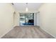 Bright dining room features sliding glass doors with views of the pool and backyard at 25422 Aysen Dr, Punta Gorda, FL 33983