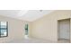 Spacious living room boasts vaulted ceilings and ample natural light at 25422 Aysen Dr, Punta Gorda, FL 33983