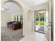Inviting living room featuring neutral walls, carpeted floors, and lots of natural light at 25422 Aysen Dr, Punta Gorda, FL 33983