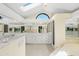 Bright bathroom with dual vanities, ample counter space, and elegant finishes at 25422 Aysen Dr, Punta Gorda, FL 33983