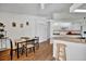 Eat-in kitchen with granite counters features stainless microwave and white appliances at 27142 Villarrica Dr, Punta Gorda, FL 33983