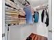 Organized walk-in closet featuring wire shelving and hardwood floors at 27142 Villarrica Dr, Punta Gorda, FL 33983