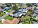 Overhead view of the property showcasing a spacious backyard, mature trees, and neighborhood charm at 2845 64Th S Ter, St Petersburg, FL 33712