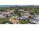 A charming neighborhood featuring cozy homes, verdant landscaping, and a glimpse of Tampa Bay in the background at 2845 64Th S Ter, St Petersburg, FL 33712