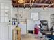 Unfinished basement with laundry area, exposed ceiling, and a small window for natural light at 2845 64Th S Ter, St Petersburg, FL 33712