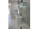 Bright bathroom featuring a modern soaking tub, glass shower, and elegant marble tile at 3204 W Grace St, Tampa, FL 33607