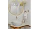 Elegant bathroom featuring a unique sink, decorative mirror, and modern fixtures at 322 Beach Rd, Sarasota, FL 34242