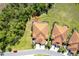 An aerial view showcases the home's roof and backyard at 324 Casalino Dr, Nokomis, FL 34275
