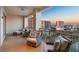 A large outdoor balcony offers city views and comfortable cushioned seating at 35 Watergate Dr # 1402, Sarasota, FL 34236