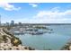Picturesque aerial view showcasing the marina, waterfront, and cityscape at 35 Watergate Dr # 1402, Sarasota, FL 34236