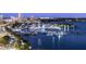Picturesque aerial view showcasing the marina and city skyline, highlighting the property's waterfront access at 35 Watergate Dr # 1402, Sarasota, FL 34236
