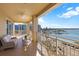 Spacious balcony with seating, perfect for enjoying waterfront and city views at 35 Watergate Dr # 1402, Sarasota, FL 34236