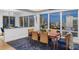 Bright dining room with seating for six offering beautiful city and waterfront views at 35 Watergate Dr # 1402, Sarasota, FL 34236