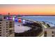 Scenic aerial view of the bridge, bay, and city skyline at sunset at 35 Watergate Dr # 1402, Sarasota, FL 34236