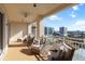 Spacious balcony with comfortable seating and a stunning view of the city skyline at 35 Watergate Dr # 1402, Sarasota, FL 34236