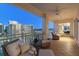 Relax on this expansive balcony with comfy seating and stunning city and water views at 35 Watergate Dr # 1402, Sarasota, FL 34236