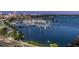Marina view showcasing numerous boats docked and a scenic cityscape backdrop at 35 Watergate Dr # 1402, Sarasota, FL 34236