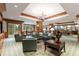 Inviting lounge area with comfortable seating, elegant chandeliers, and a relaxing atmosphere at 35 Watergate Dr # 1402, Sarasota, FL 34236