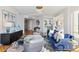 Inviting living room boasts stylish furnishings, a decorative bar, and an open layout at 35 Watergate Dr # 1402, Sarasota, FL 34236