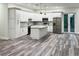 Spacious kitchen features a large island, stainless steel appliances, and plenty of cabinets at 3525 Mcintosh Rd, Sarasota, FL 34232