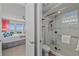 Modern bathroom with bedroom and glass shower at 384 Aruba Cir # 103, Bradenton, FL 34209