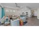 Open-concept living space with a modern kitchen, comfortable seating, and stylish decor in a bright, airy setting at 384 Aruba Cir # 103, Bradenton, FL 34209