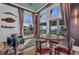 Lounge area with couches, chairs, and coastal views, creating a relaxing space for residents to enjoy at 384 Aruba Cir # 103, Bradenton, FL 34209
