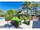 Comfortable outdoor seating area with plush cushions, ideal for lounging and socializing by the pool at 384 Aruba Cir # 103, Bradenton, FL 34209