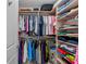Organized walk-in closet featuring shelving and ample storage space at 384 Aruba Cir # 103, Bradenton, FL 34209