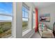 Bright windows overlooking scenic landscape and marsh views at 384 Aruba Cir # 103, Bradenton, FL 34209