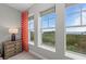 Bedroom windows overlooking lush scenery at 384 Aruba Cir # 103, Bradenton, FL 34209
