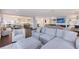This expansive open-concept living space connects dining, kitchen and living areas creating a bright home at 400 Golden Gate Pt # 51 & 52, Sarasota, FL 34236