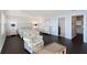 Spacious main bedroom features a queen bed, water views, and access to a walk-in closet at 400 Golden Gate Pt # 51 & 52, Sarasota, FL 34236