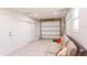Spacious garage with a comfortable seating area and convenient access to the outdoors at 411 S Oxford Dr # 411, Nokomis, FL 34275
