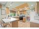 An open kitchen featuring an eat-in breakfast bar with a view to the backyard at 4320 Bent Tree Blvd, Sarasota, FL 34241