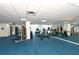 Community gym featuring treadmills, weights, and ample workout space at 455 Longboat Club Rd # 407, Longboat Key, FL 34228