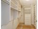 Custom closet with shelving and drawers for optimal storage and organization at 455 Longboat Club Rd # 407, Longboat Key, FL 34228