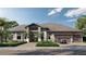 Charming single-story home featuring a well-manicured lawn, two-car garage, and paver driveway at 4644 Higel Ave, Sarasota, FL 34242