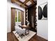 Sophisticated home office featuring beamed ceilings, dark wood shelving, and a window overlooking the yard at 4644 Higel Ave, Sarasota, FL 34242