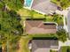 This bird's-eye view captures the home with its manicured lawn and nearby landscaping at 4954 Newport News Cir, Lakewood Ranch, FL 34211
