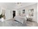 Spacious bedroom with large windows, closet, and en-suite bathroom at 4954 Newport News Cir, Lakewood Ranch, FL 34211