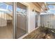 This backyard offers a wooden patio with fencing and access to the inside at 5753 Summer Side Ln # 8A, Sarasota, FL 34231